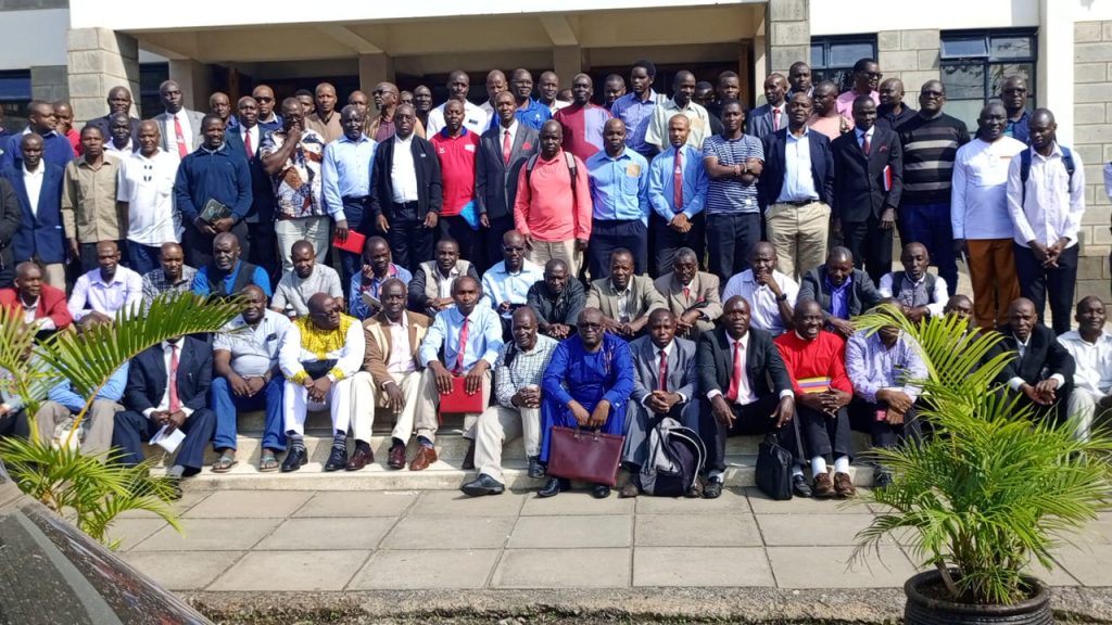 Quakermen stop for a photo after a seminar